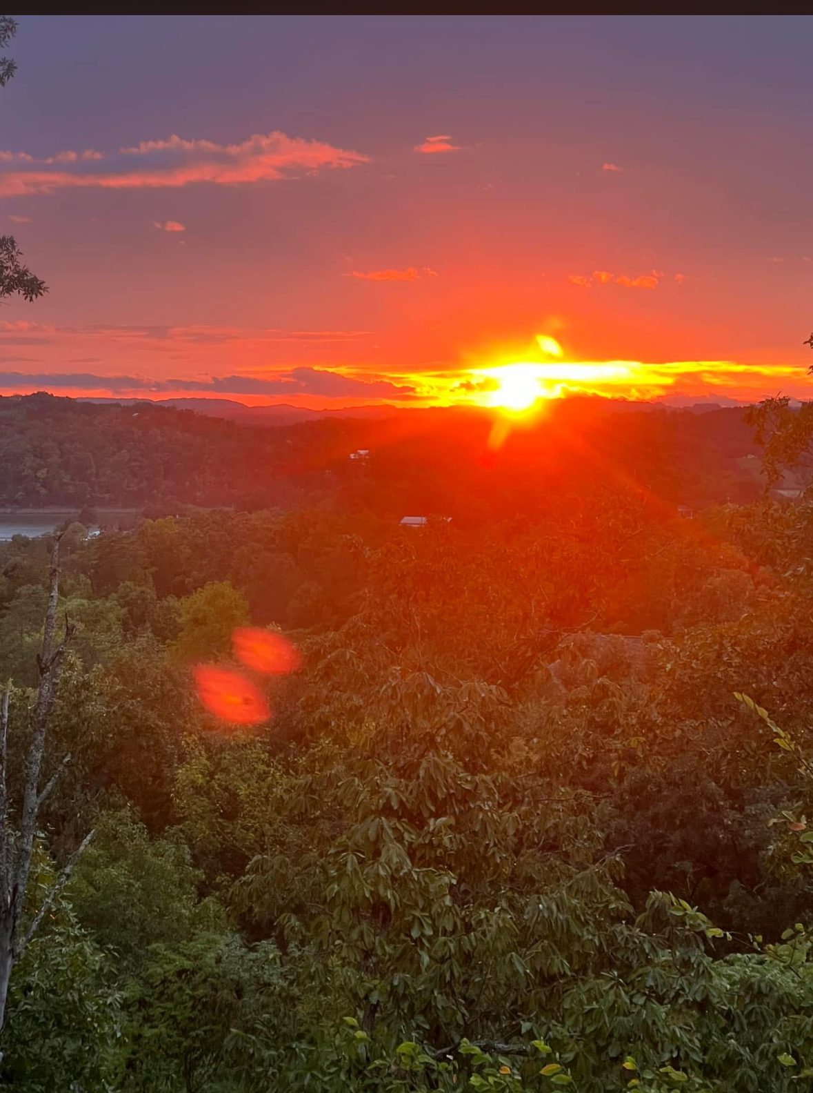 Orange sunset over Douglas Lake from the porch